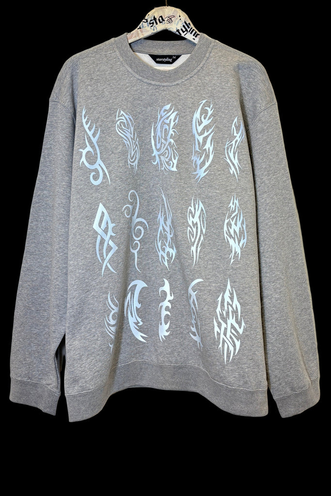Tribal Reflective Sweater: Ancient Patterns Meet Modern Glow