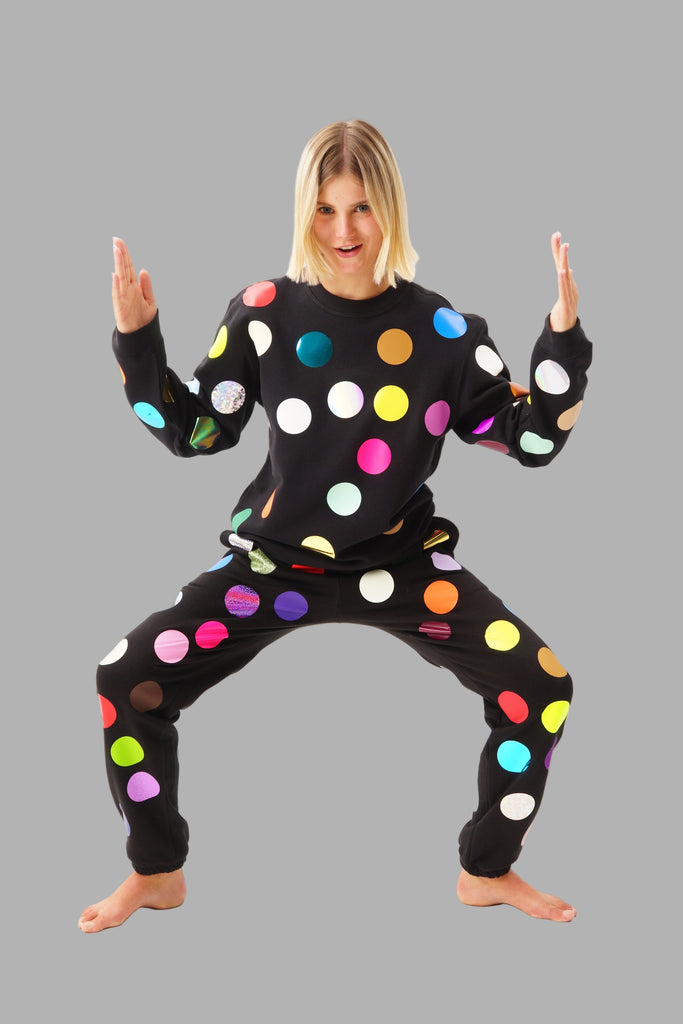 Black tracksuit printed with colorful polka Dots 