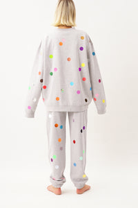 Grey tracksuit printed with colorful small polka dots