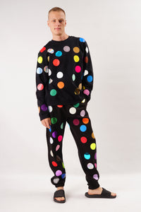 Black jumper printed with colorful polka Dots 