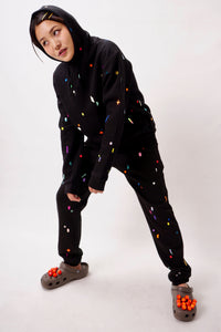 flimmer hoody, small geometric shapes in colorful transfer prints on black