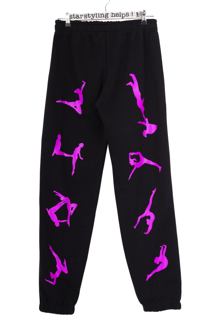 Black joggers printed with acrobat silhouettes in purple transfer foil 