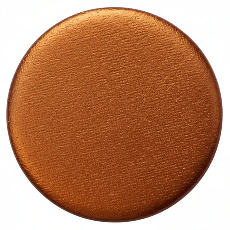 Round metallic copper button accessory with smooth textured surface on white background