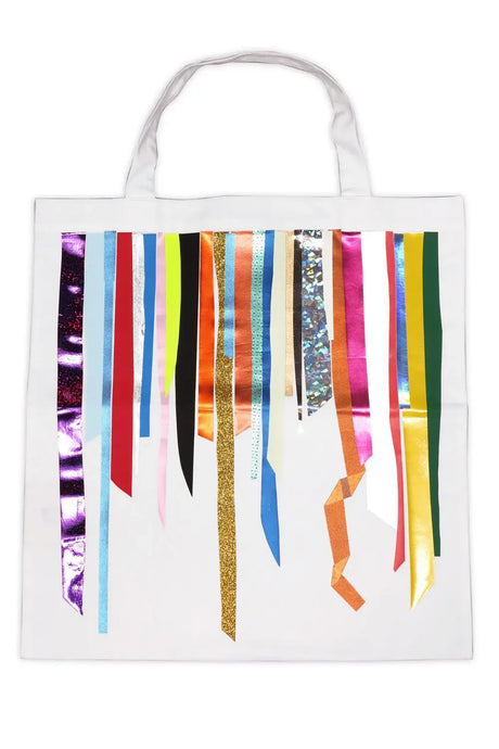 White tote bag with colorful metallic and glitter foil stripes, vibrant accessory design.