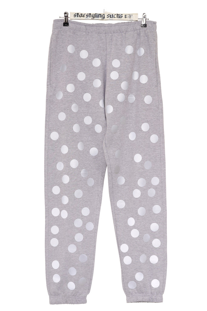 Printed grey joggers with reflective polka dots on front and back
