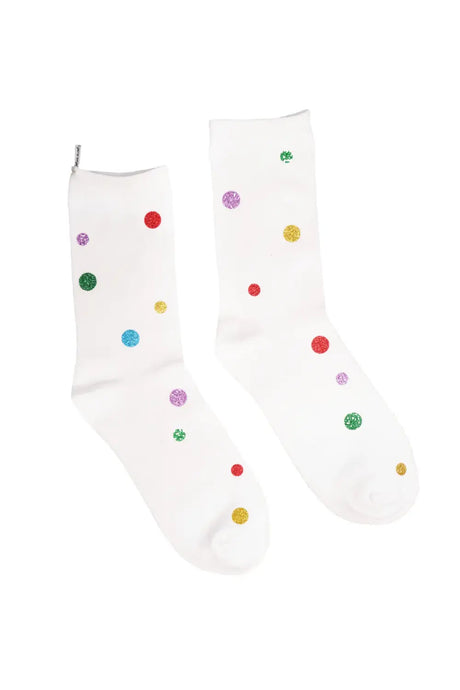 White socks with colorful glitter dot pattern, fun fashion accessory on white background