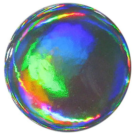 Round holographic button with rainbow iridescent colors on white background
