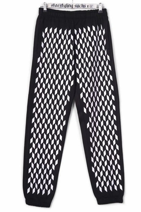 Black joggers with geometric white rhombus allover print, front view on hanger