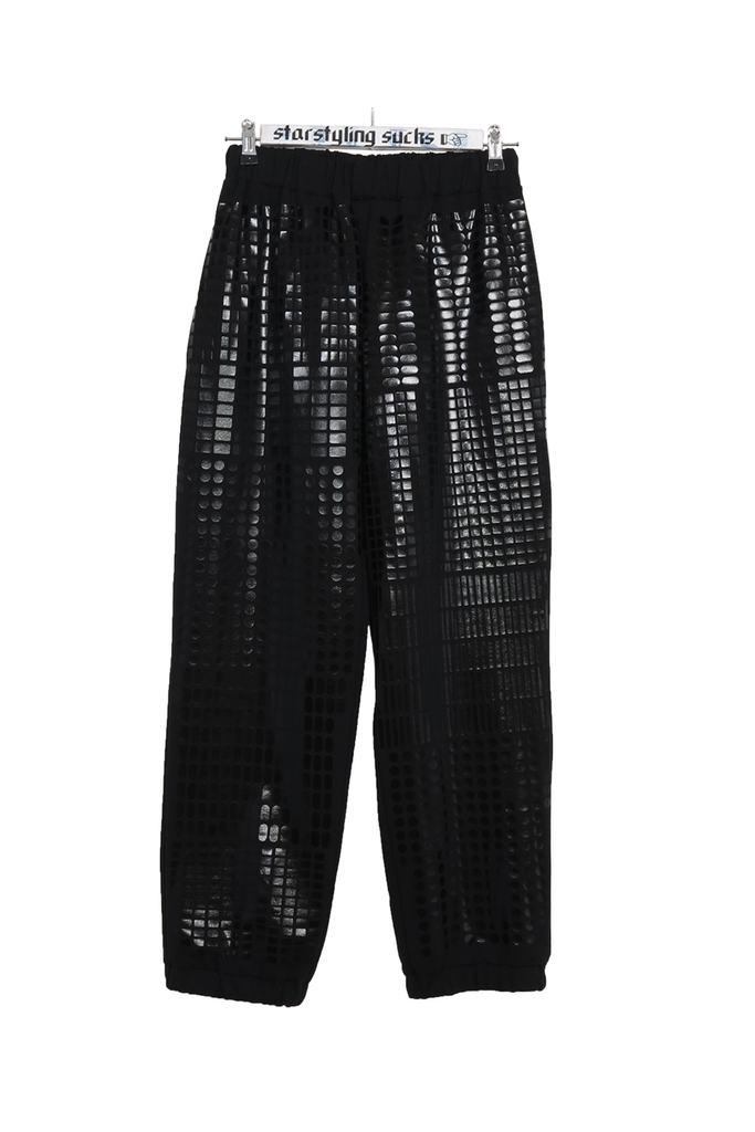black joggers with glossy pattern printed on top in matching color 