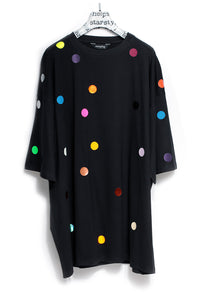 Black oversized t-shirt printed with colorful polka dots