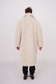 Teddy fake fur coat in creme color with stones, charms and funny buttons sewn allover