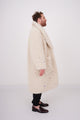 Teddy coat in creme color with stones and funny charms sewn allover